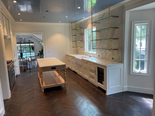 Kitchen Remodel – Island and glass‑shelf wall